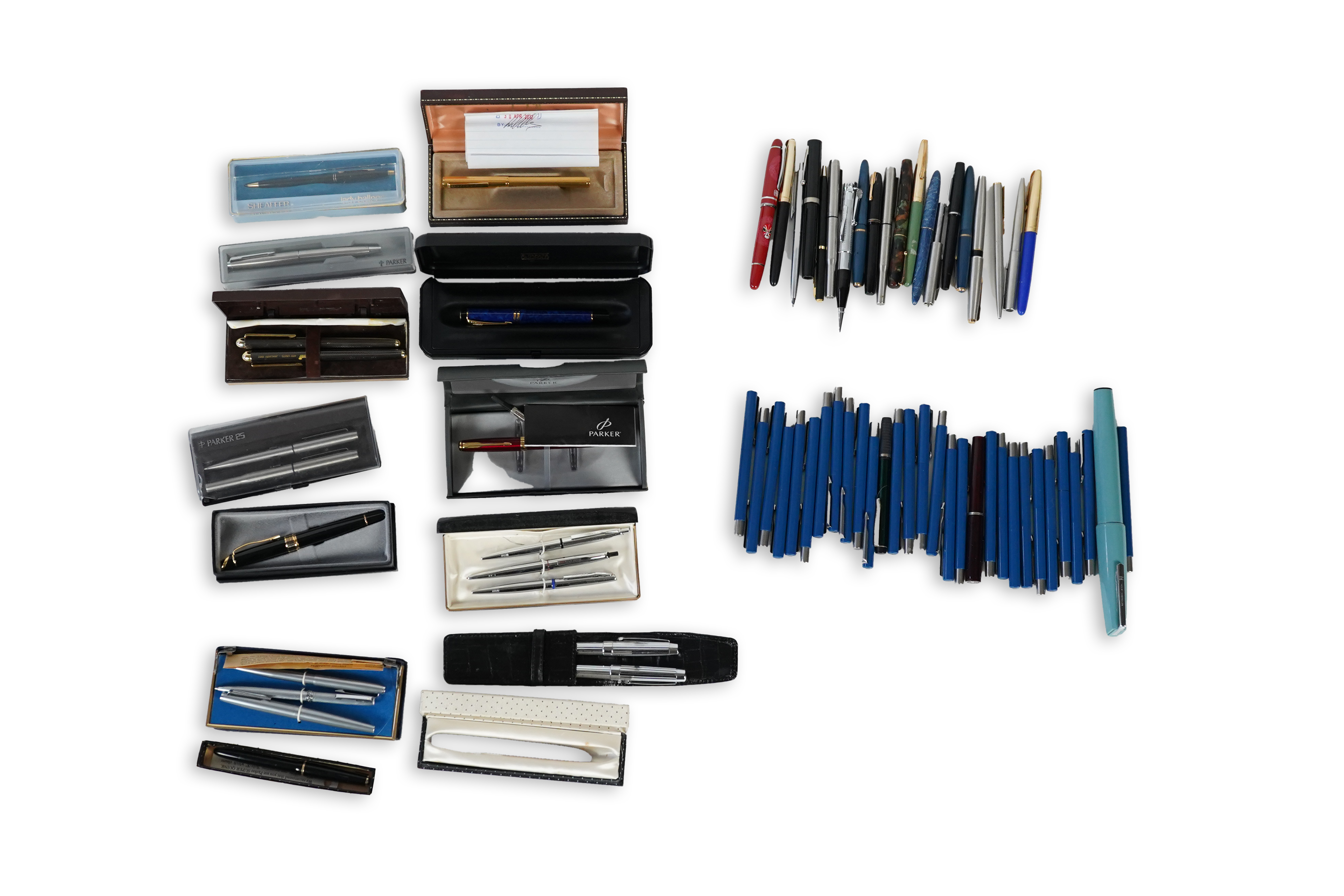 A cased Parker duofold ballpoint pen, a cased Parker Sonnet lacquer ruby red fountain pen, a Dunhill gold plated fountain pen and various fountain pens and ballpoint pens including Parker, Sheaffer, Quill, etc.